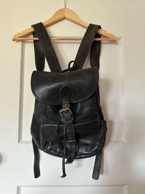 Vintage Black Leather Backpack with Brass Details